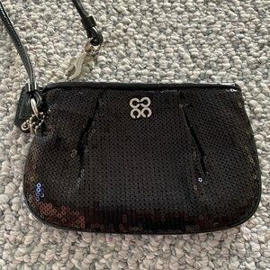 Like new Coach sequin wristlet
